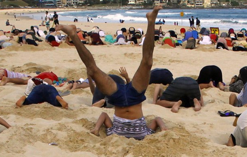 G20 climate change protesters bury their heads in the sand