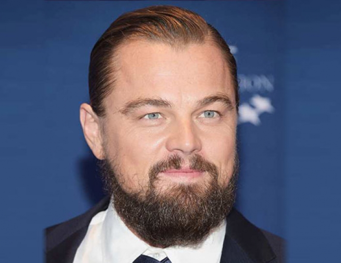A €12 Million Koons Sculpture And DiCaprio’s Banksy Sell For Charity At Cannes