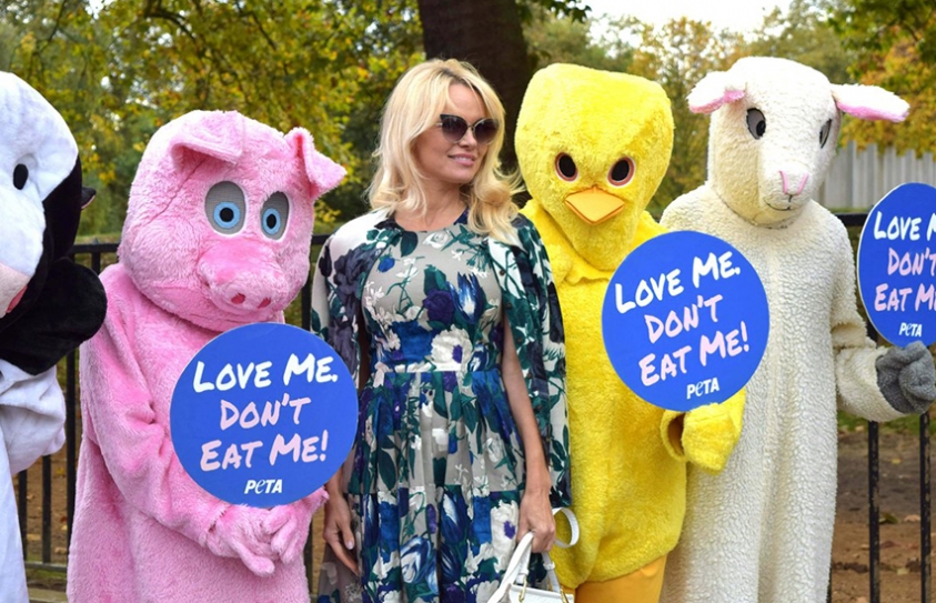 Pamela Anderson Joins Giant Animal Mascots To Promote Vegan Diet