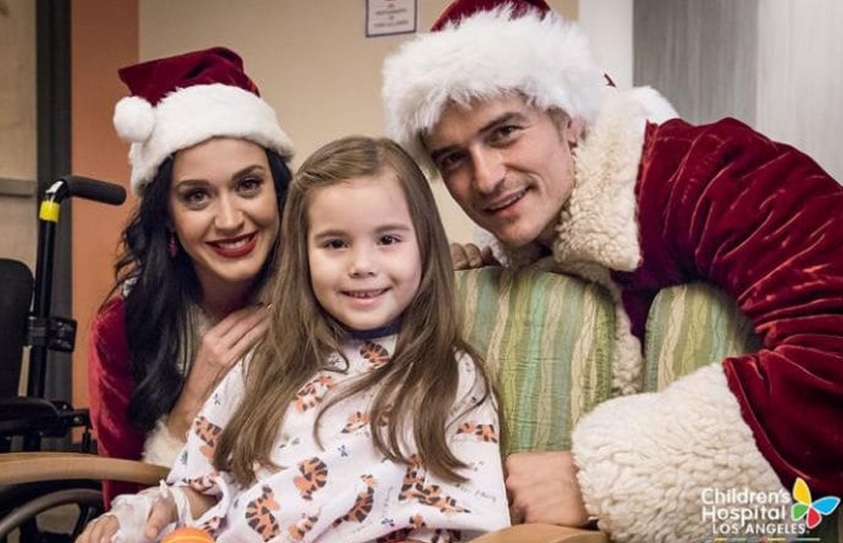 Katy Perry And Orlando Bloom Spread Christmas Cheer tTo Children's Hospital As Santa And Mrs. Claus 