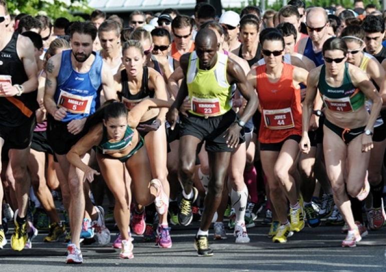 Runner reaches finish line after thousand-mile charity journey