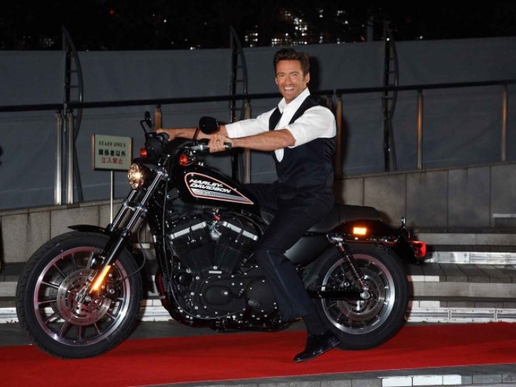 Chris Evans Signs Harley-Davidson For Charity At Captain America Premiere