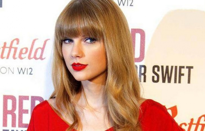 Swift shells $6,000 in charity auction