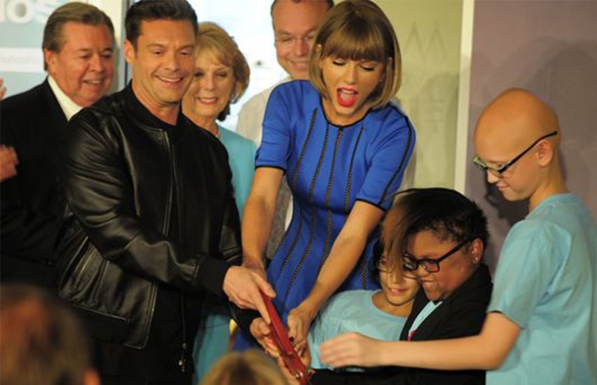 Taylor Swift Helps Ryan Seacrest Open Studio At Children's Hospital