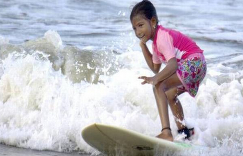 When Little Kamali Rides The Waves 